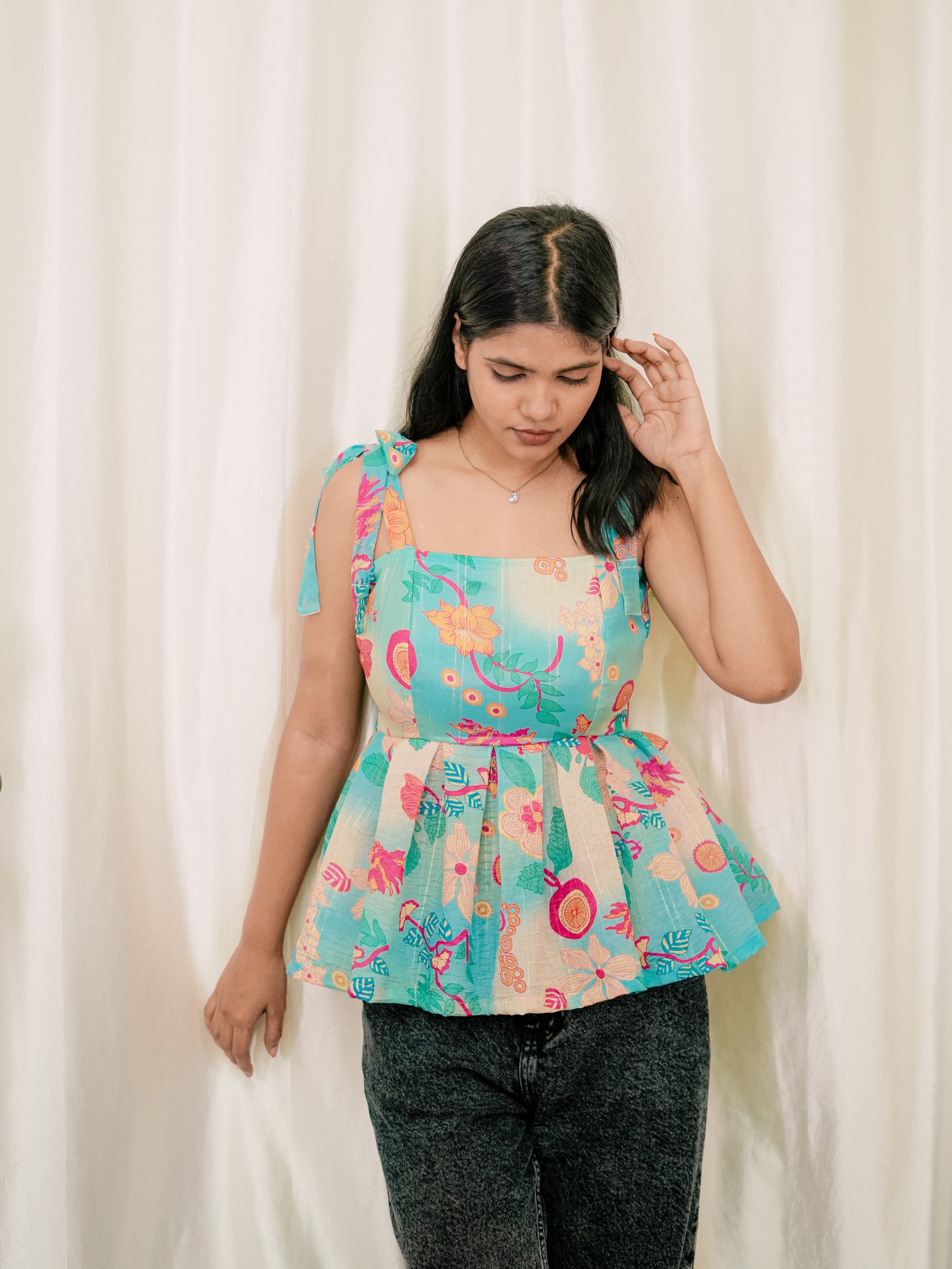 Knotty Peplum Top